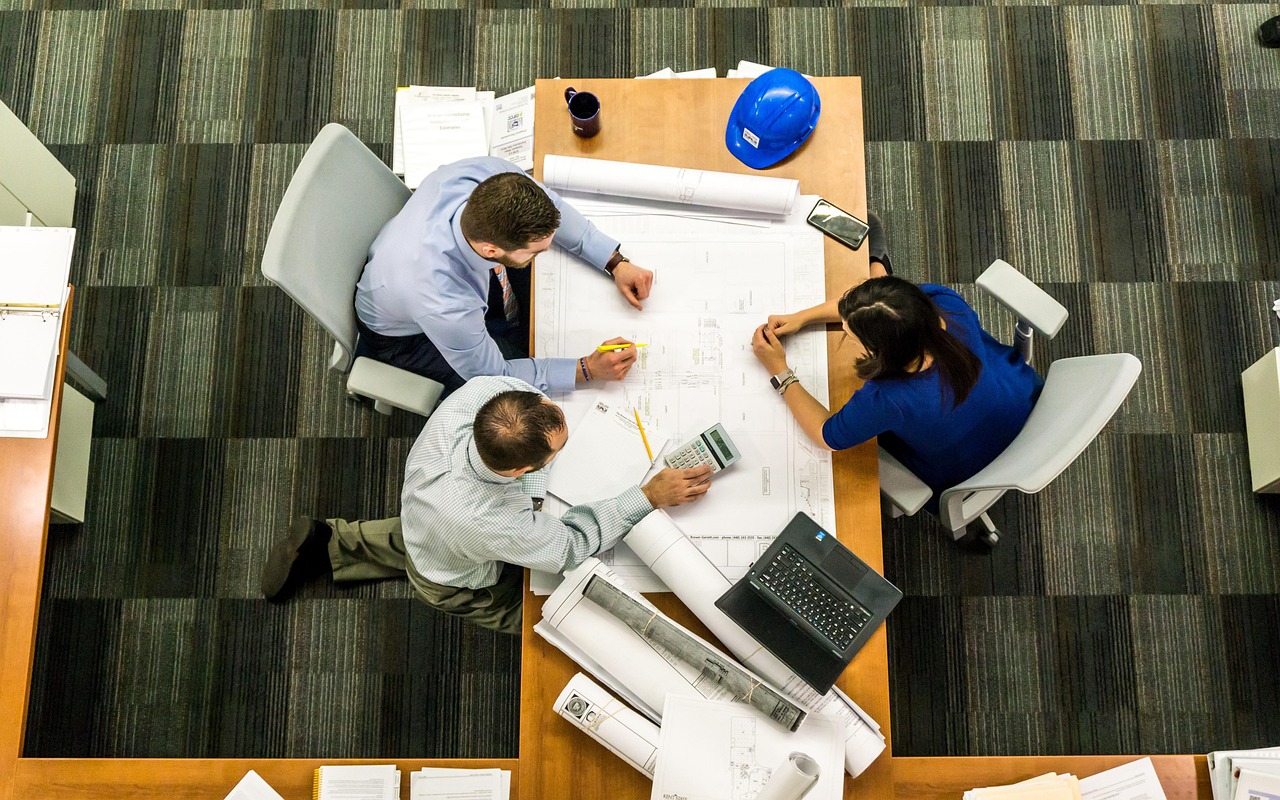 Small team collaborating at a table
